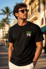 Coco Love black tee worn at a beach festival — front chest logo and full back print