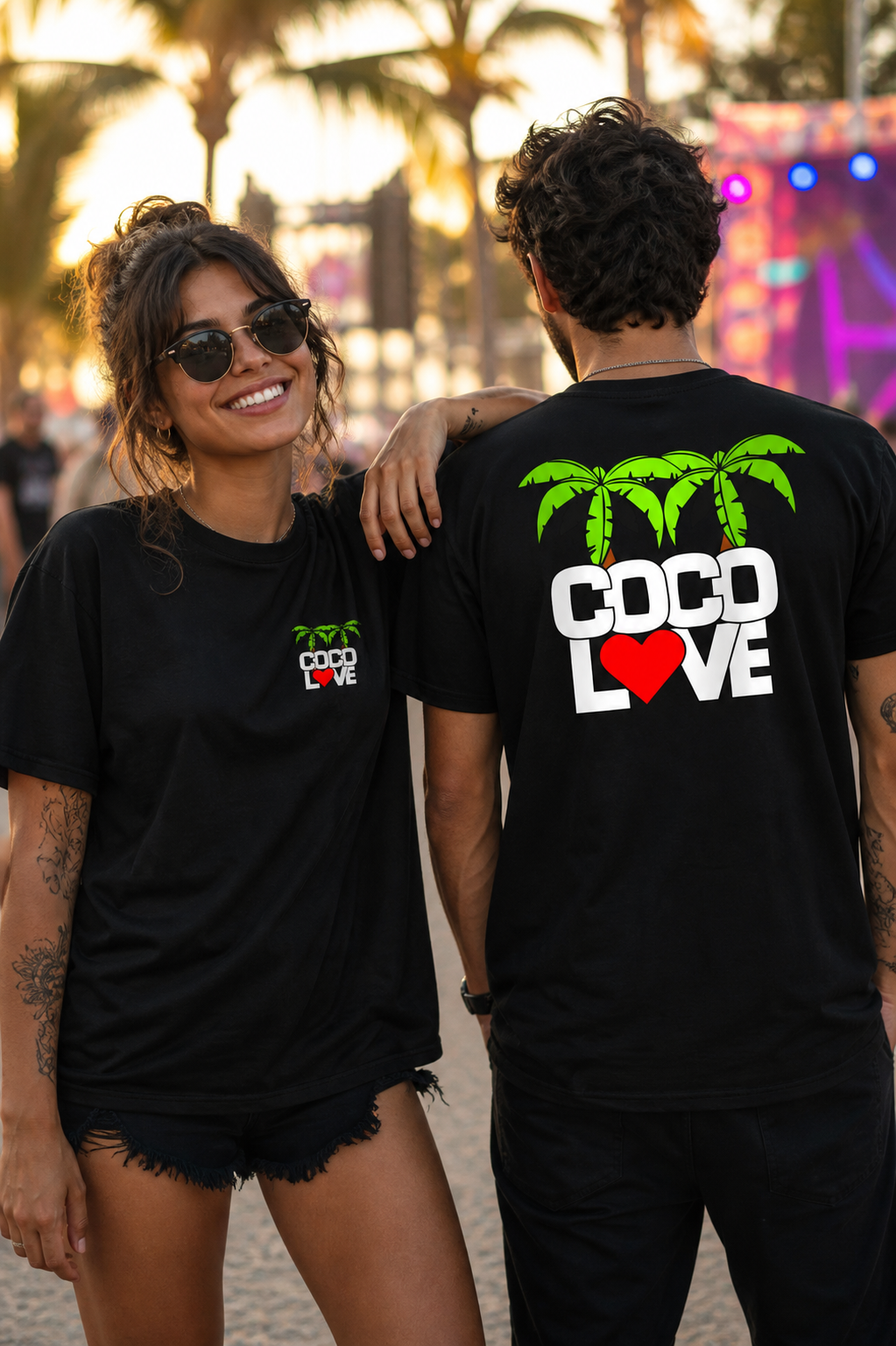 Woman wearing Coco Love black tee with left-chest palm logo on the boardwalk