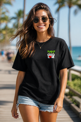 Man wearing Coco Love black tee with palm and heart chest logo